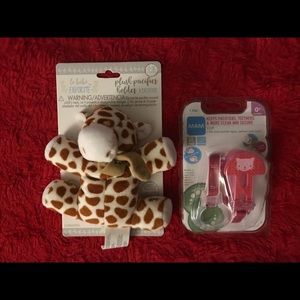 Two brand new pacifier holders .